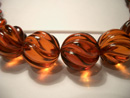 Cognac colour amber necklace - spiral cut beads