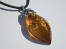 Amber pendants for sale. We have various styles of amber pendants: heart shaped amber pendants, cross shape amber pendants, with and without sterling silver mounts.