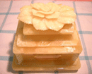 amber jewelry box with a rose on top