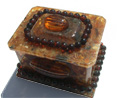 Amber jewelry box with a rose on top