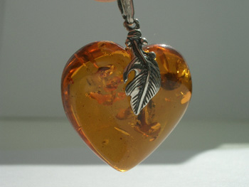 Honey amber heart pendant with spangles