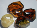 We offer for sale various styles of  amber rings. We manufactue big, small, massive amber rings cut of a single piece of nartual raw amber stones. Our rings are 100% handmade.