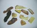 Raw amber waste pieces - rough amber waste - pieces of raw amber material - natrual raw material